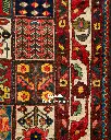 فرش دستباف آنتیک بختیاری طرح خشتی ۴/۵۴ متری